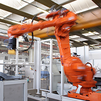 Anthropomorphic robot tending to the grinding machine. Anthropomorphic robot tending to the grinding machine.